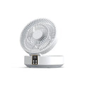 White portable rechargeable folding fan with night light and remote control on a desk