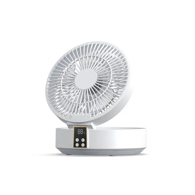 White portable rechargeable folding fan with night light and remote control on a desk