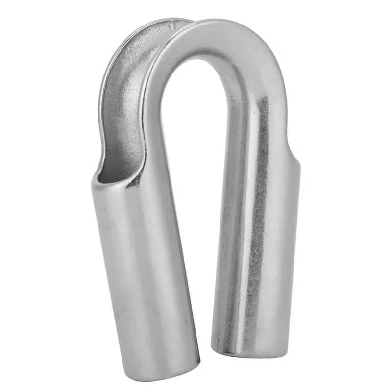 Stainless steel tubular chicken heart ring round sleeve ring set on a workshop surface