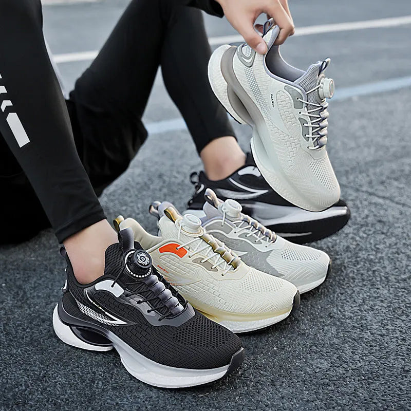 Men's white rotating buckle running shoe with Fly-knit mesh upper and low-top design.