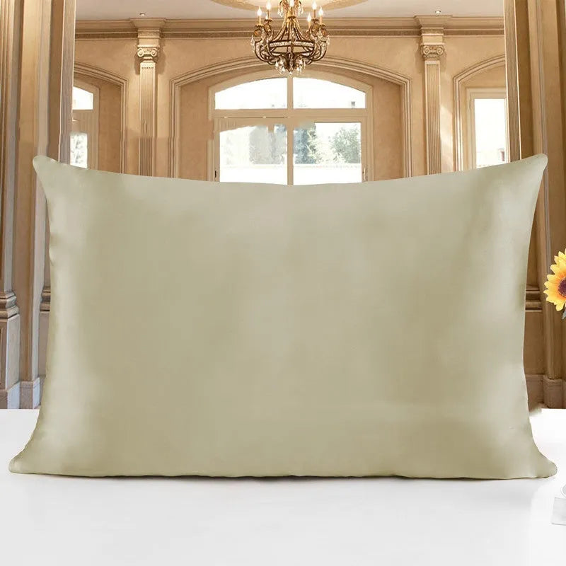 19 M double-sided silk pillowcase in apricot colour, showing envelope closure and smooth fabric texture.
