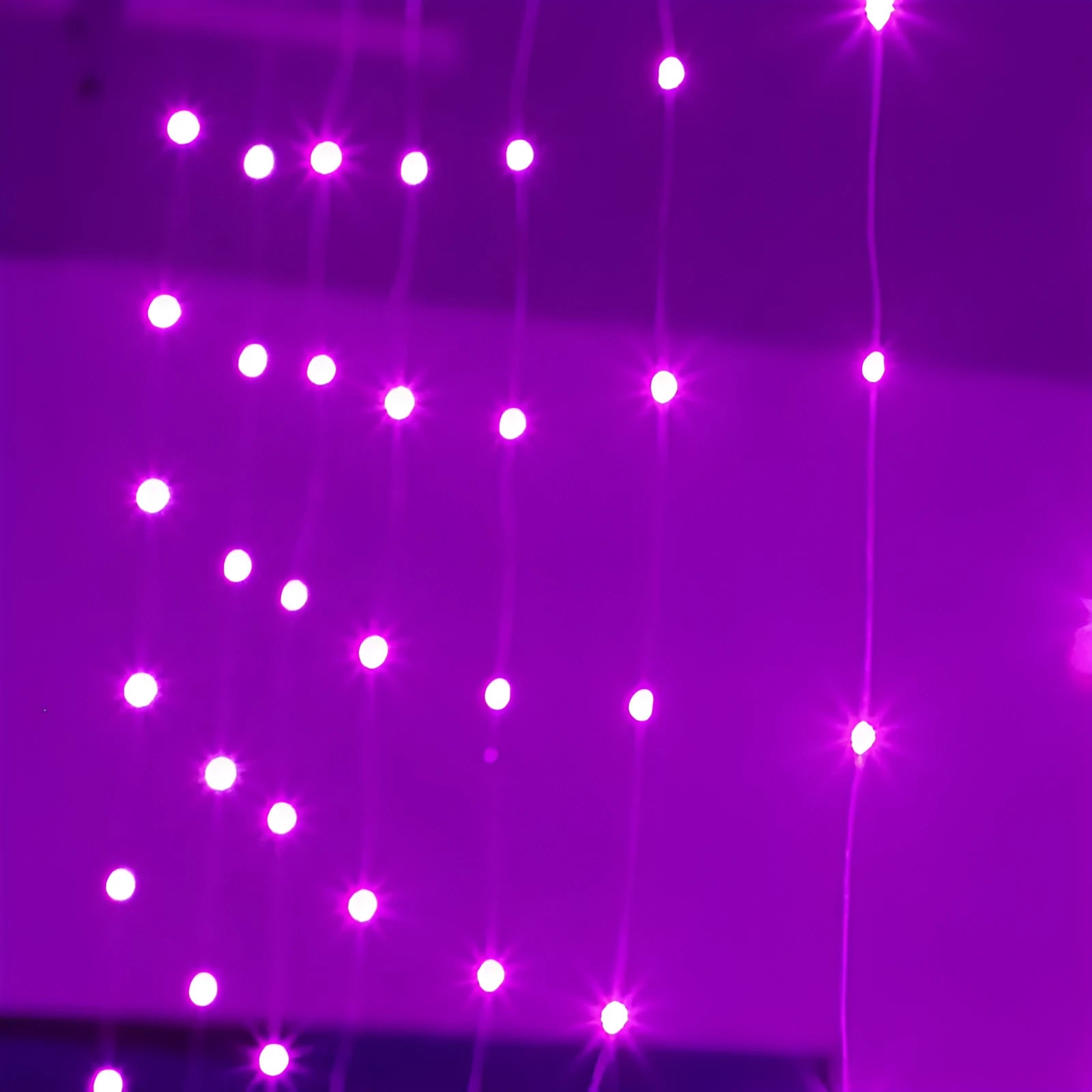 Copper wire curtain fairy lights with multiple LED beads, powered by USB for decorative use.