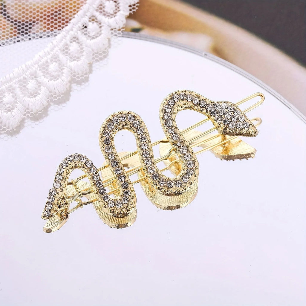 Vintage snake hair barrette with rhinestone detailing in gold and silver colour options