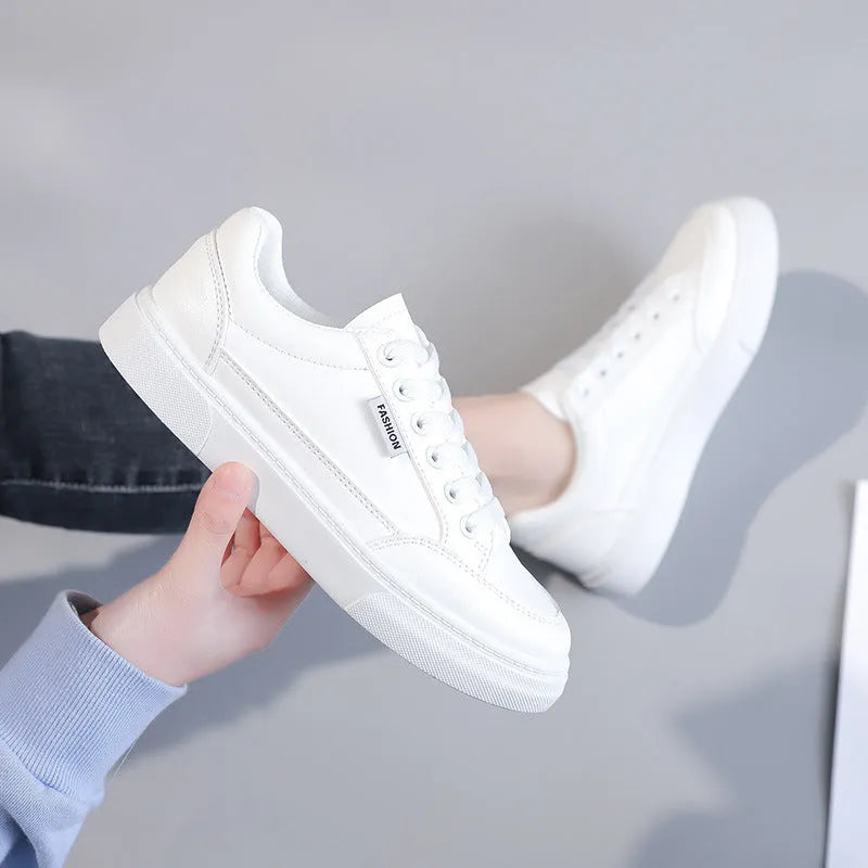 Women's low-top Korean style sneakers in white or brown artificial PU leather with plastic sole