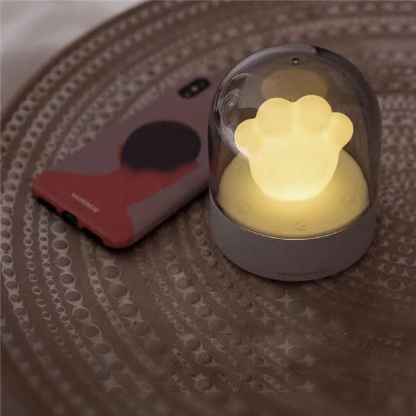 Grey or pink cat paw shaped USB rechargeable night light with music box and adjustable brightness levels