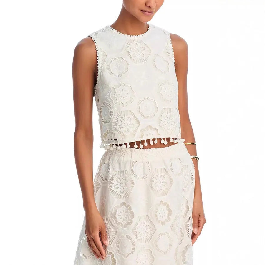 White women's sleeveless top and long embroidered skirt two-piece suit