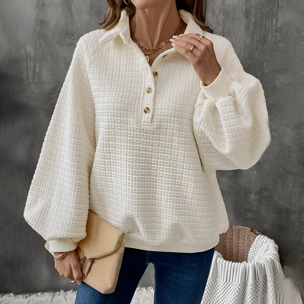 Women's milky white polo collar textured sweater on a hanger