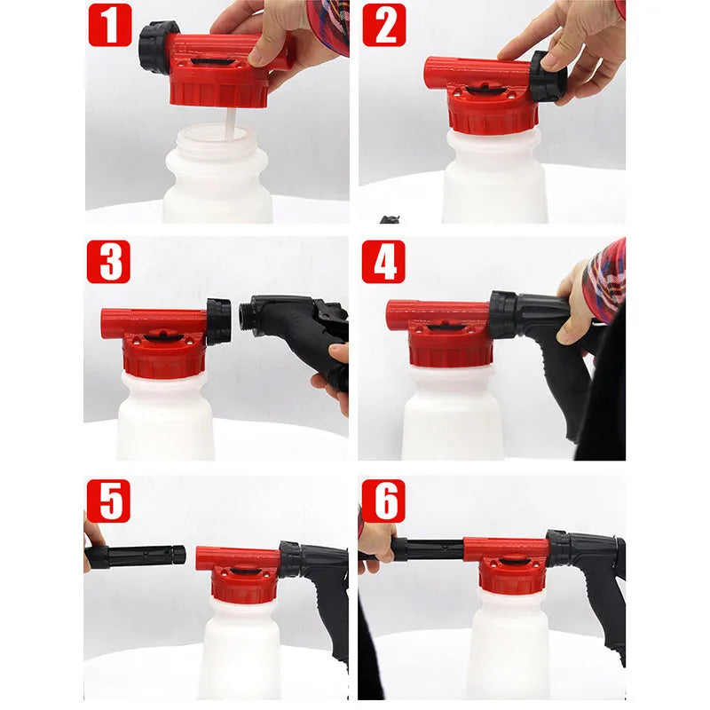 A grey foam pot high pressure water gun for garden use on a wooden surface.