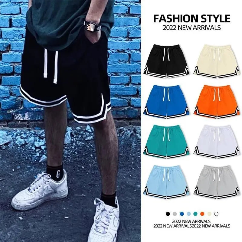 Men's loose-fit polyester summer shorts in various colours with elastic waistband