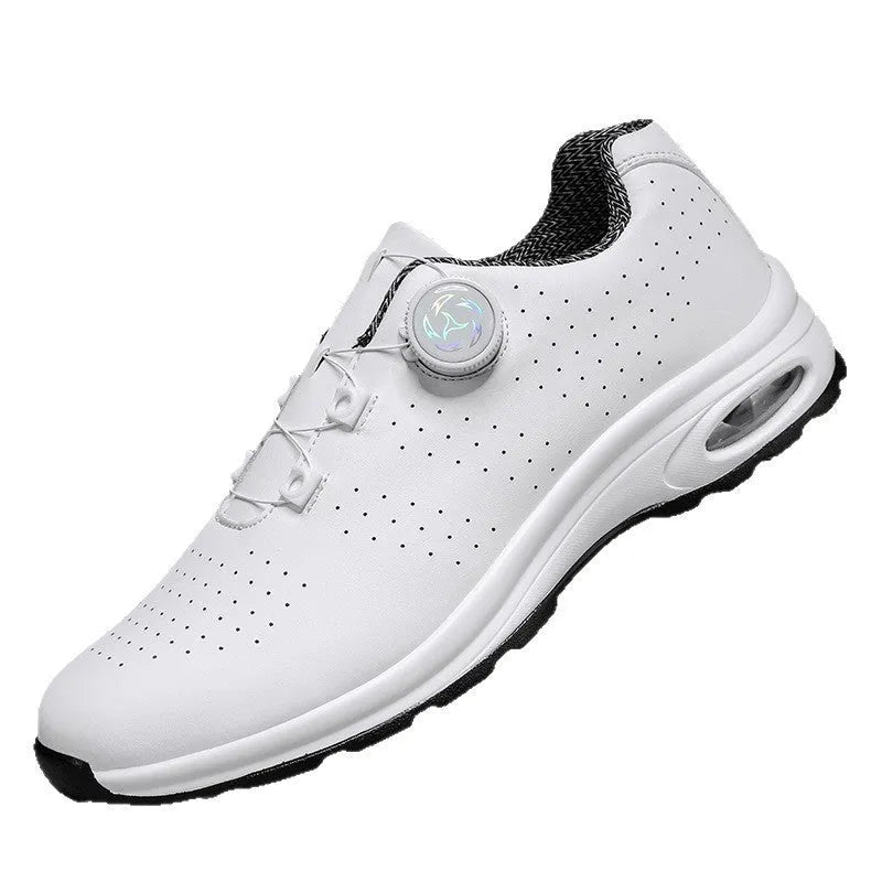 Black and white low top casual shoes with mesh upper, composite sole, and cross shoulder straps