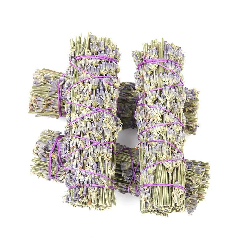 A single 4-inch long dried lavender aromatherapy stick on a plain background.