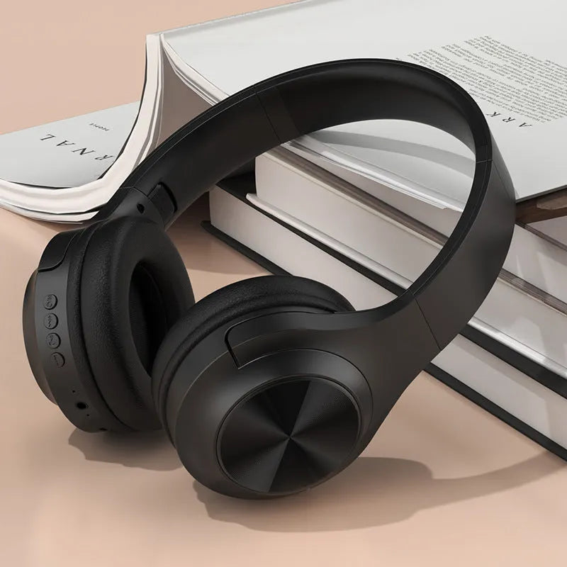 Creative wireless Bluetooth headset in Ivory White colour with head-mounted design and charging case