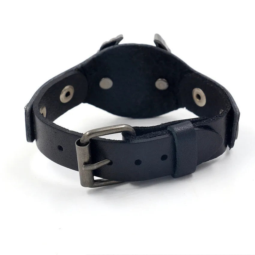 Black geometric leather men's bracelet with a detailed alloy eagle buckle clasp on a white background.