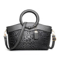Fabric ladies casual shoulder handbag in multiple colours showing zipper and organisational pockets.