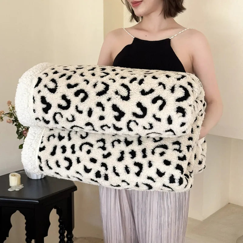 Double-layer leopard print jacquard taffeta blanket shown in camel zebra pattern