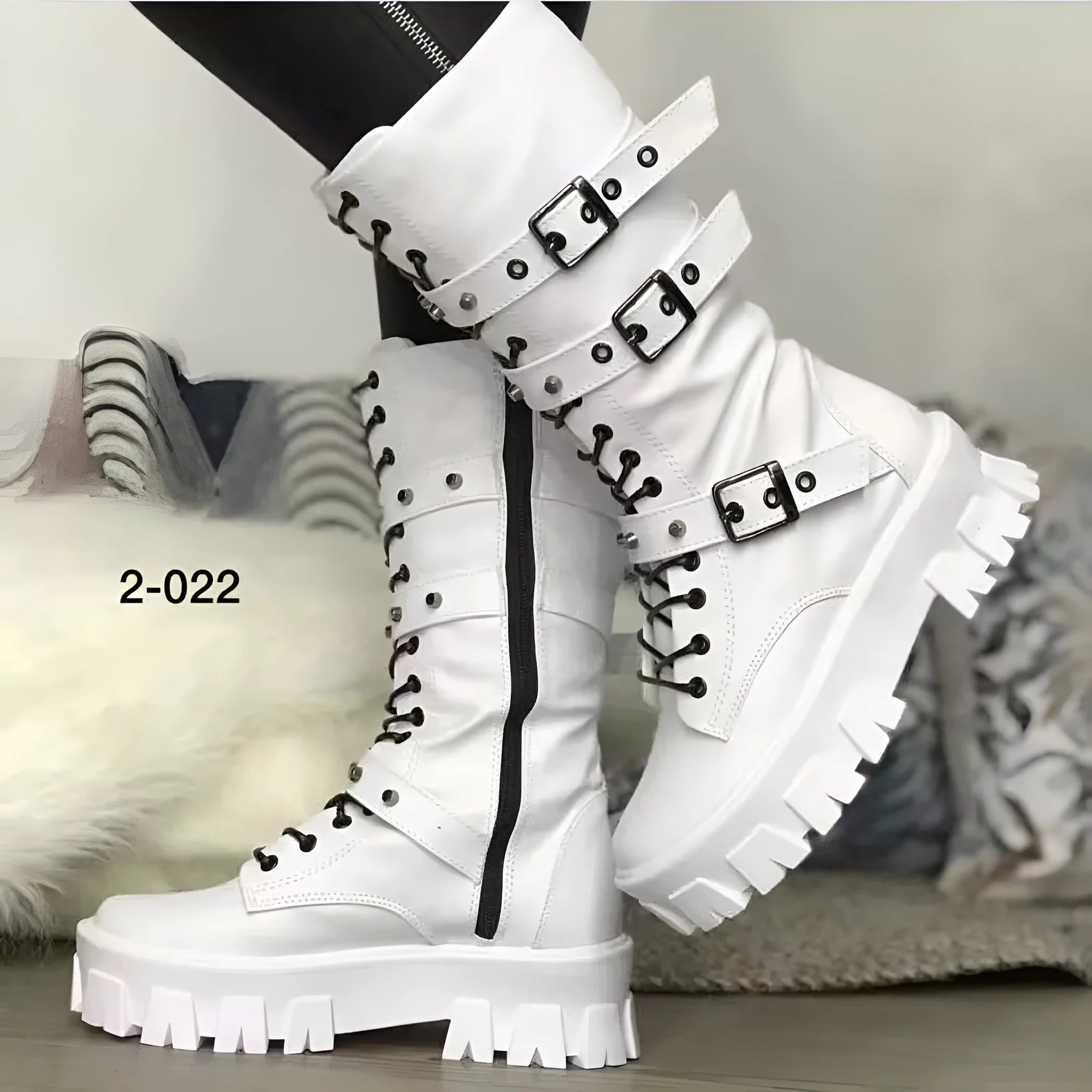 Women's black mid-calf buckle boots with side zipper and round toe