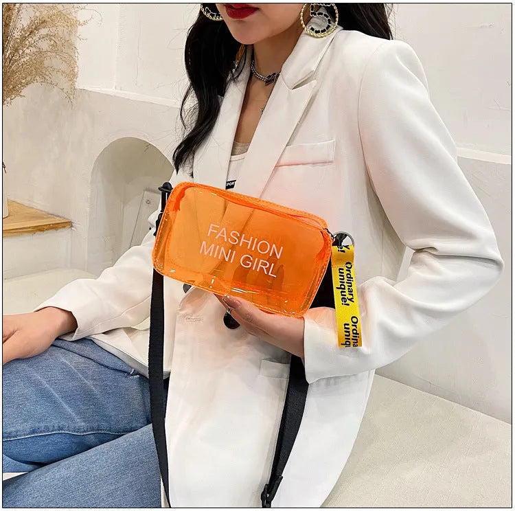 Transparent square jelly shoulder bag in various colours with adjustable strap and phone compartment