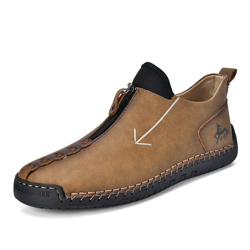 Men's black front-zipper casual leather-style boots with round toe and hand-stitched detail on a white background.