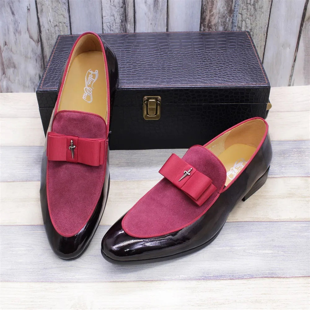 Men's low-top leather shoes in black with a tassel detail and glossy patent leather accents.