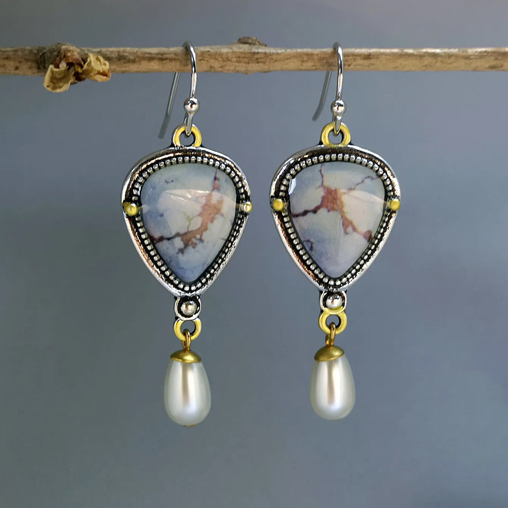 Women's lavender turquoise and white pearl drop earrings with geometric retro design.