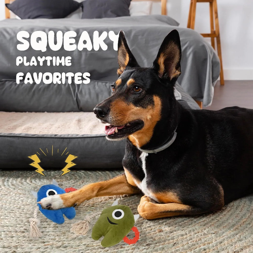 Blue and green monster dog toys with plush bodies and cotton rope limbs.