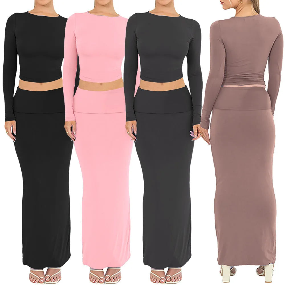 Women's black polyester two-piece suit with a top and long skirt for autumn.