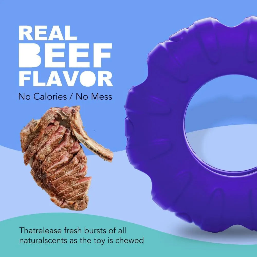 Blue natural rubber tyre-shaped dog chew toy and slow feeder with six oval openings.