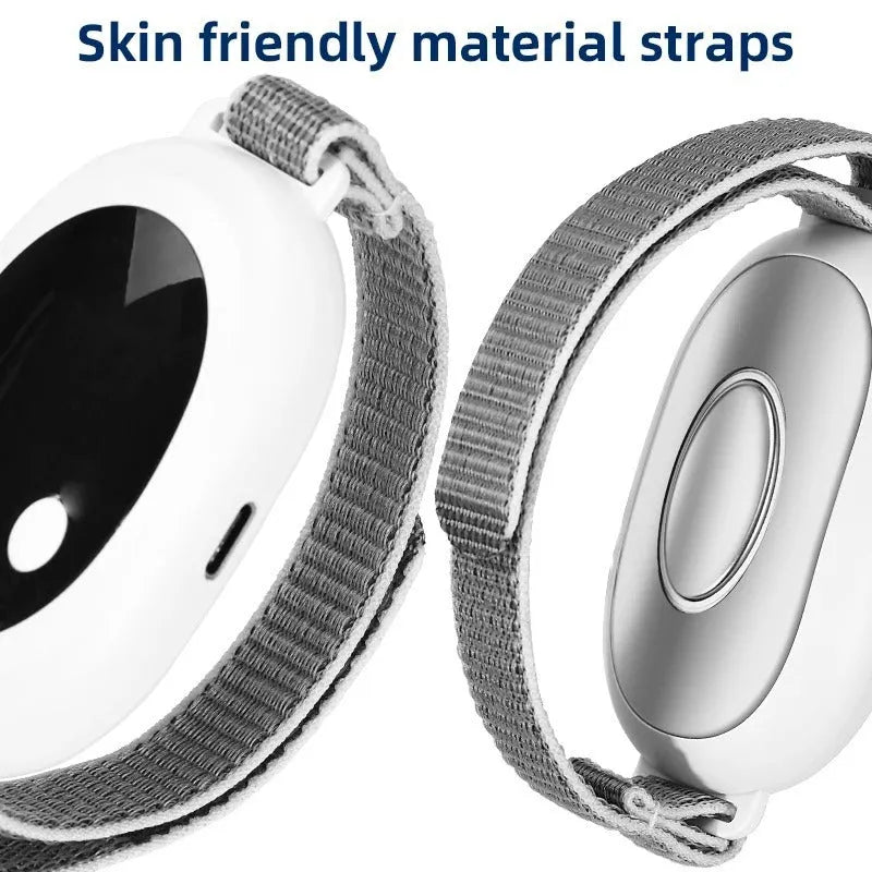 White handheld sleep aid remote control device with USB charging cable and wrist bracelet.