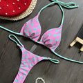 Heart print swimsuit set with backless design and split leg styling in nylon fabric