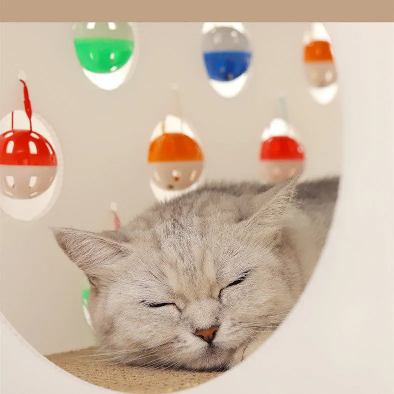 Plastic cat scratch board integrated with nest area, tunnel and bell ball toy components