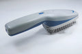 Negative ion pet comb with removable brush head and ozone cleaning function.