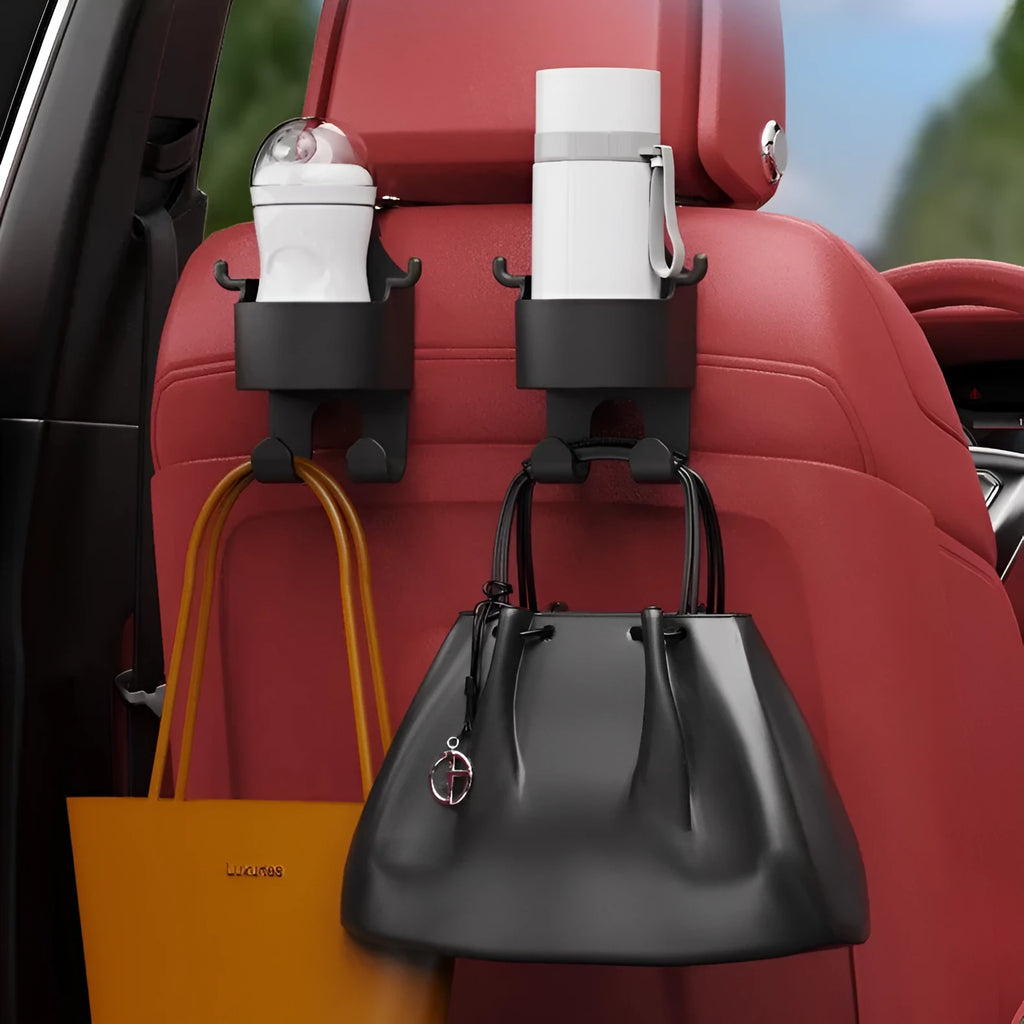 Black plastic car hook seat back organiser with cup holder mounted on vehicle headrest