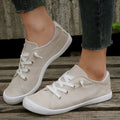Women's creamy white fabric casual sneakers with rubber sole low top design