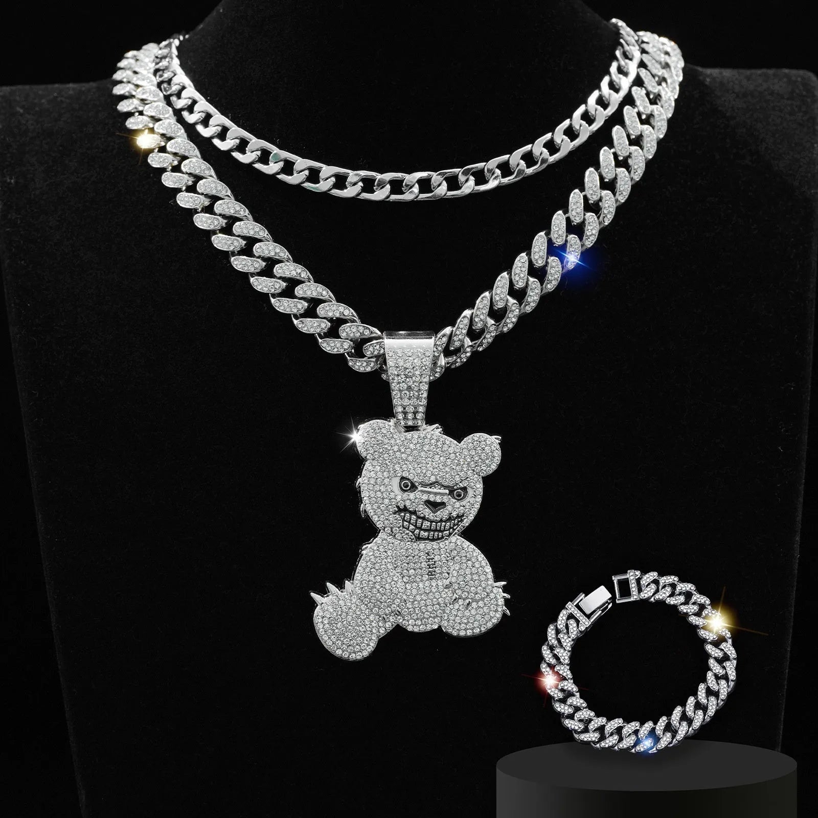 Gold three-piece jewellery set with rhinestone bear pendants on Cuban link chain necklaces and bracelet