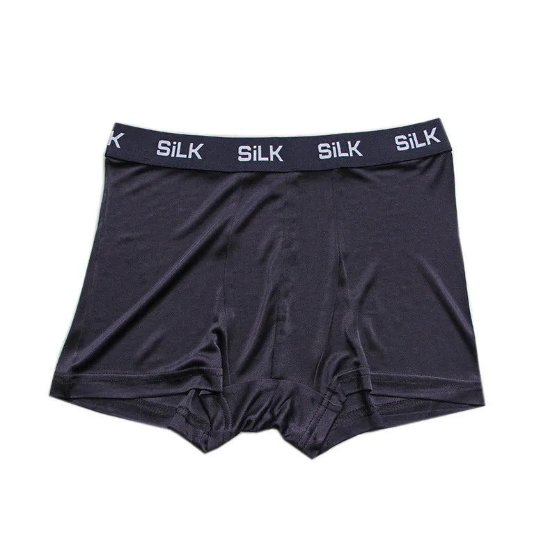 Men's loose-fit silk shorts in navy blue with mid-waist design