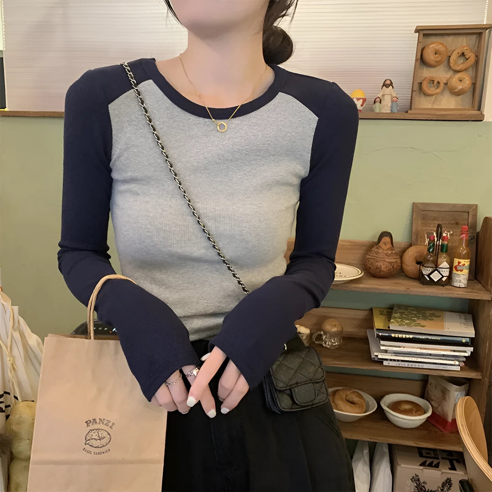 Women's oversized slim-fit casual top with long princess sleeves and embroidery detail in viscose fabric.