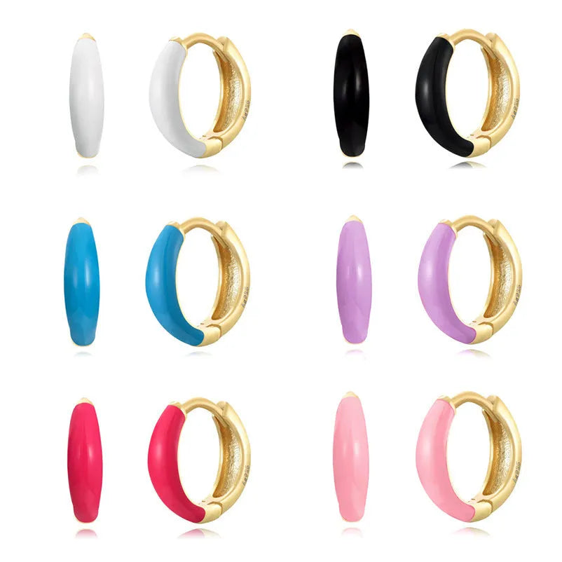 Geometric U-shaped oval curved stud earrings with a marbled dripping oil colour finish.