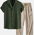 Men's loose short sleeve shirt and full-length trousers casual suit set on a hanger.