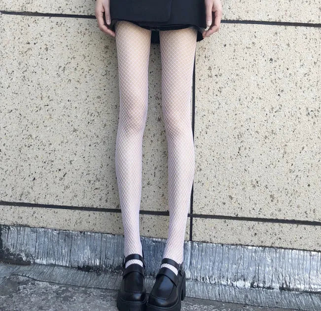 Women's black and white mesh stockings showing large, medium, and small pattern options.