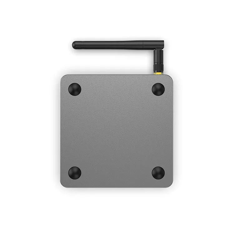 RK3566 Android smart TV set-top box with remote control and HDMI cable on a table