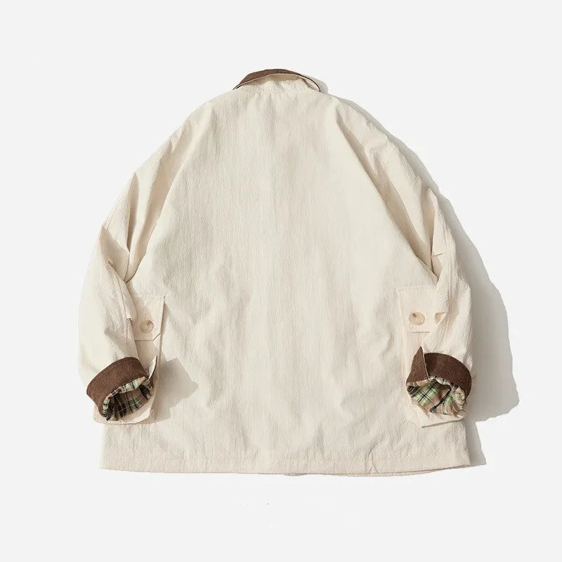 Apricot casual polyester jacket with side seam pockets on a hanger.