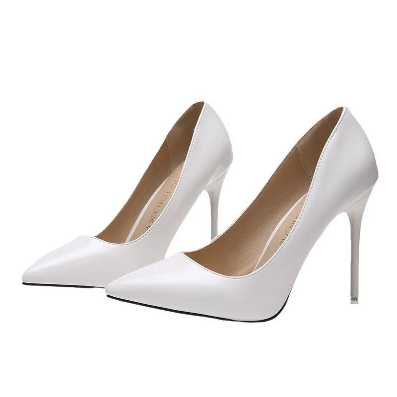 Women's pointed toe stiletto high heel pumps in apricot colour with super high heel