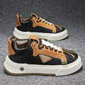 Men's beige low-top casual sneakers with an elastic band and leather stitching detail.
