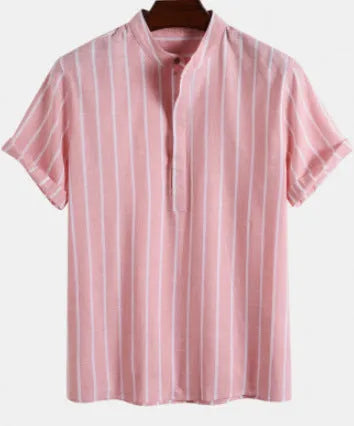 Loose fit short sleeve polo shirt with a large printed letter graphic on the chest.