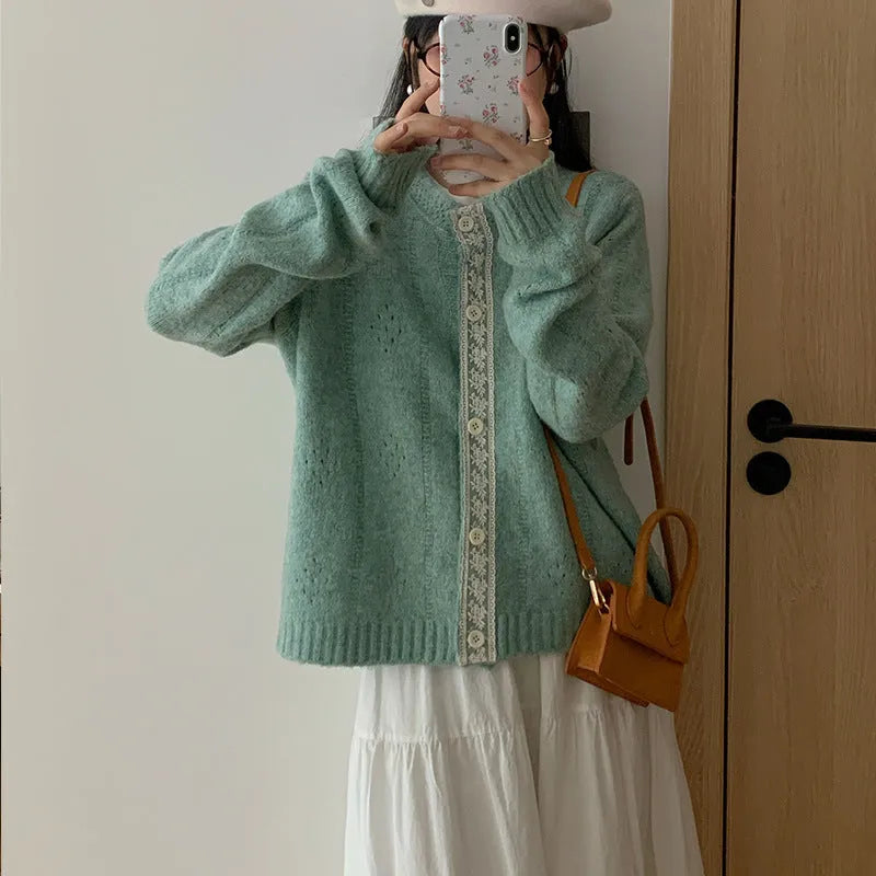 Artistic retro loose-fit viscose knitwear cardigan coat in apricot, shown open.