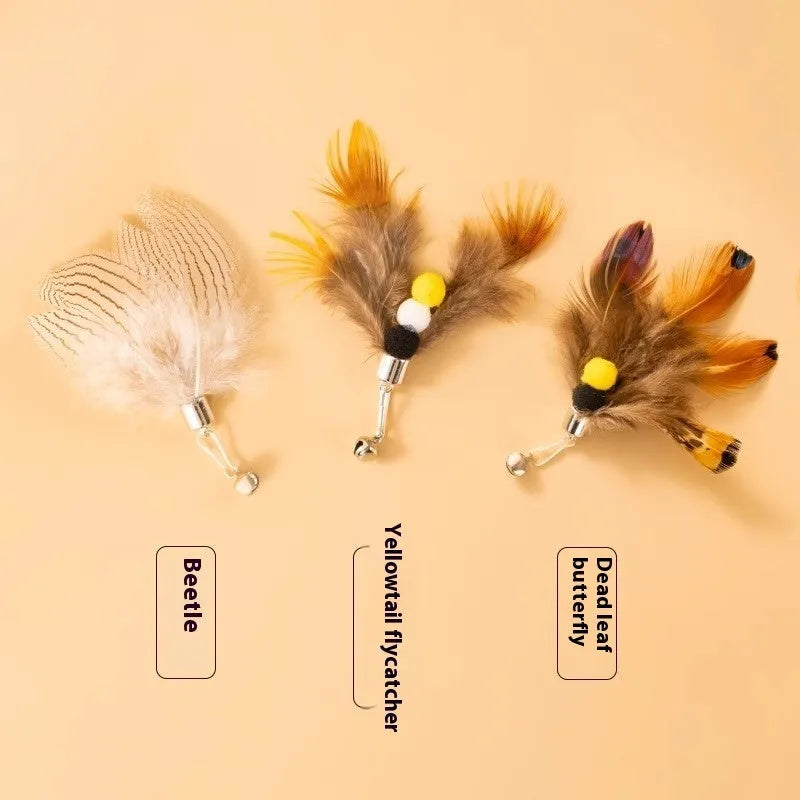 Three steel wire cat toy replacement heads with flying insect designs in different colours