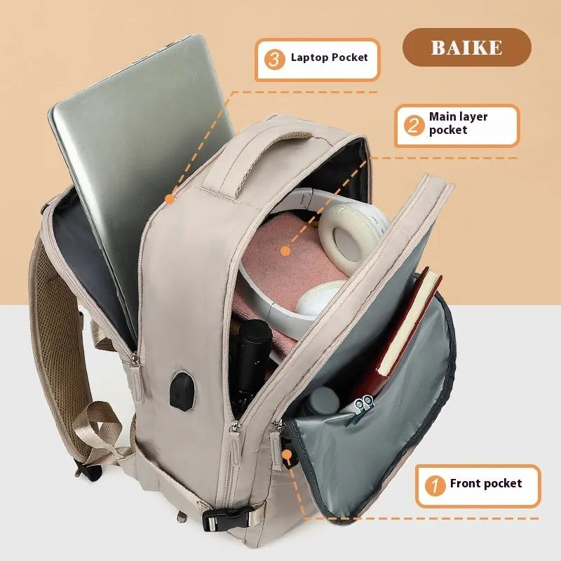 Large capacity women's travel backpack in light grey colour with curved shoulder straps