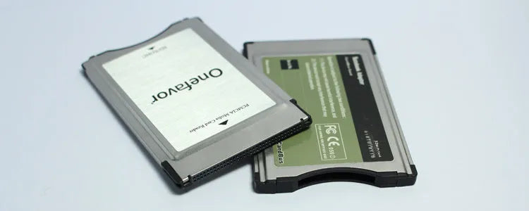 Stainless steel SD to PCMCIA adapter card with 32GB SD card for Mercedes-Benz vehicles.