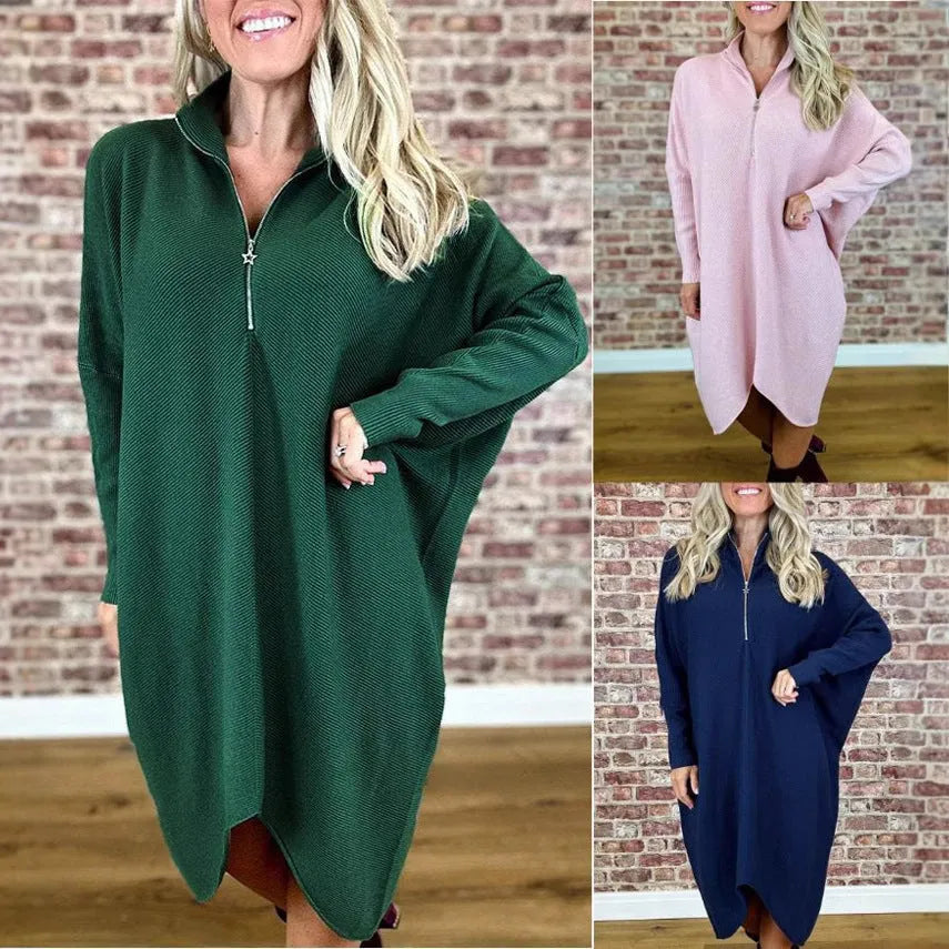 Women's solid colour loose knitted dress with raglan sleeves shown in dark green