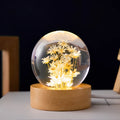 Luminous 3D dandelion crystal ball LED lamp on a beech wood stand, with USB plug.